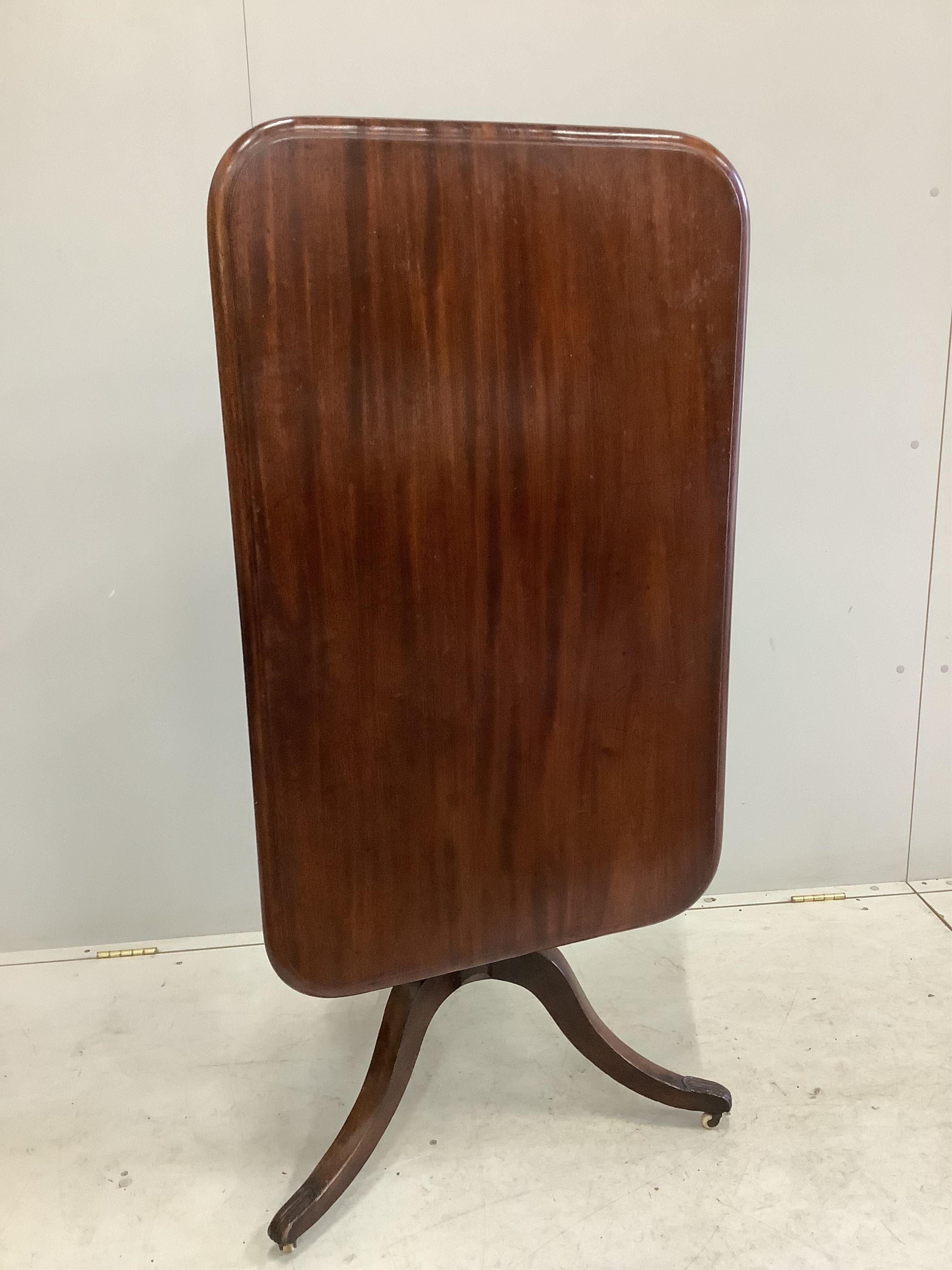 A William IV rectangular mahogany tilt top tea table, width 102cm, depth 64cm, height 72cm. Condition - fair to good